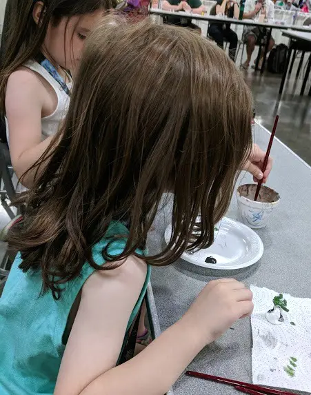 The kids painting minis at Origins Game Fair