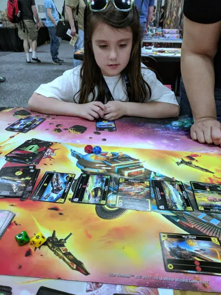 Playing Star Realms with my daughter at Origins.