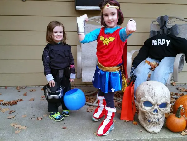 Author's kids dressed as Wonder Woman and Kylo Ren for Halloween.