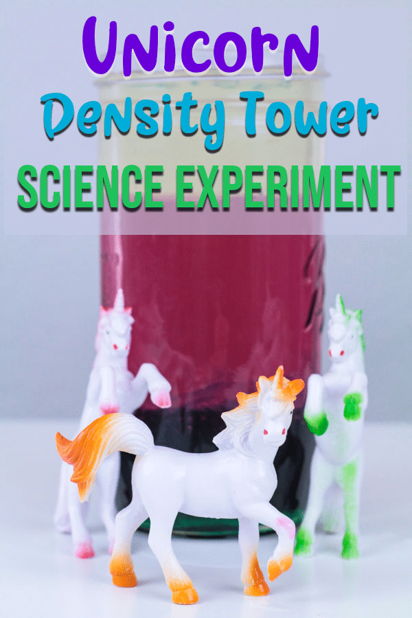 Jar with liquid layers of different colors and unicorn figures for density tower experiment.