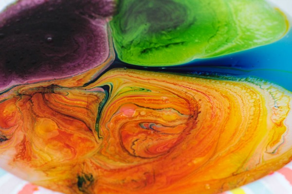 Close up of color mixing in viscosity STEAM project for kids