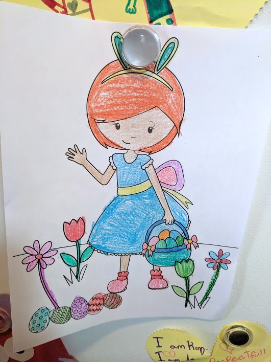 Completed girl hunting for Easter eggs coloring page