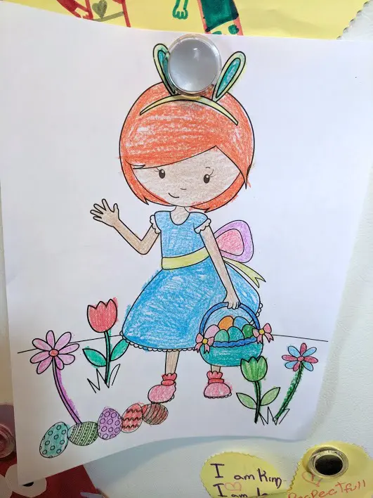 Completed girl hunting for Easter eggs coloring page
