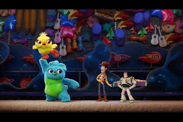 Bunny, Ducky, Woody, and Buzz at the carnival in Toy Story 4