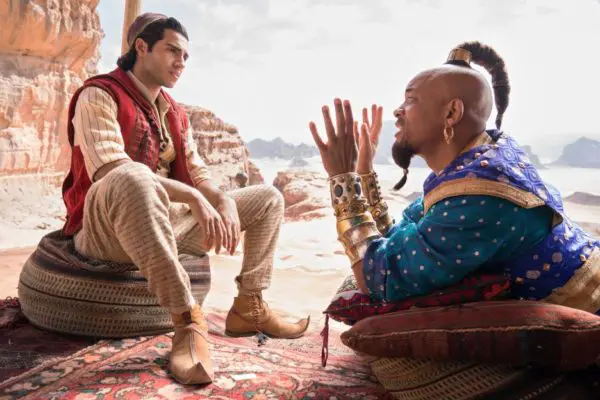 Aladdin and the Genie talking. Aladdin movie promo shot