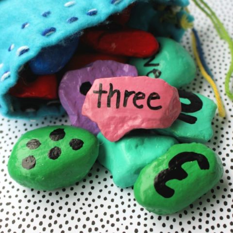 Completed number rocks spilling out of felt bag