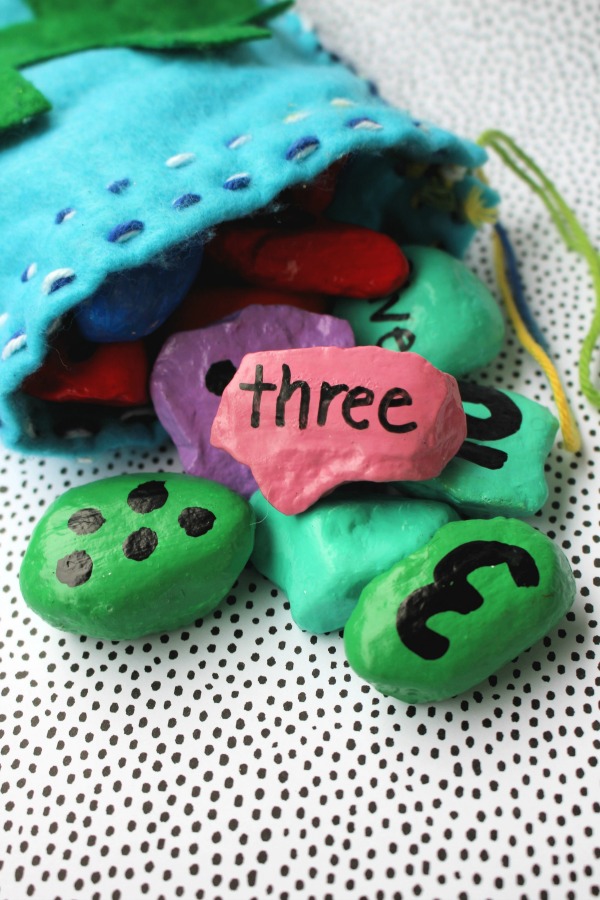 Completed number rocks spilling out of felt bag