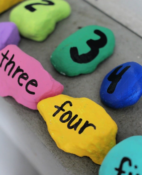 Painted rocks with numbers written on them