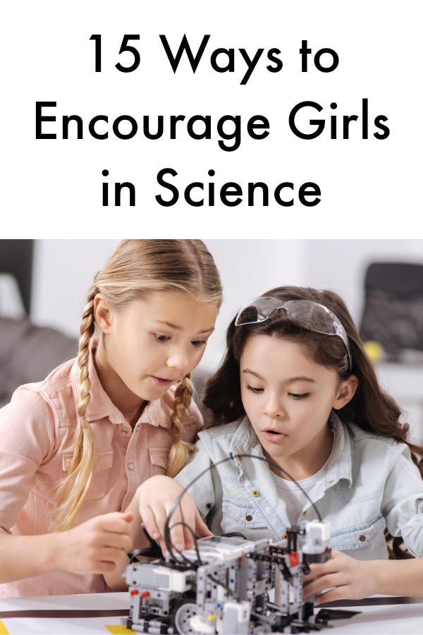 Two girls working on a robot stem project