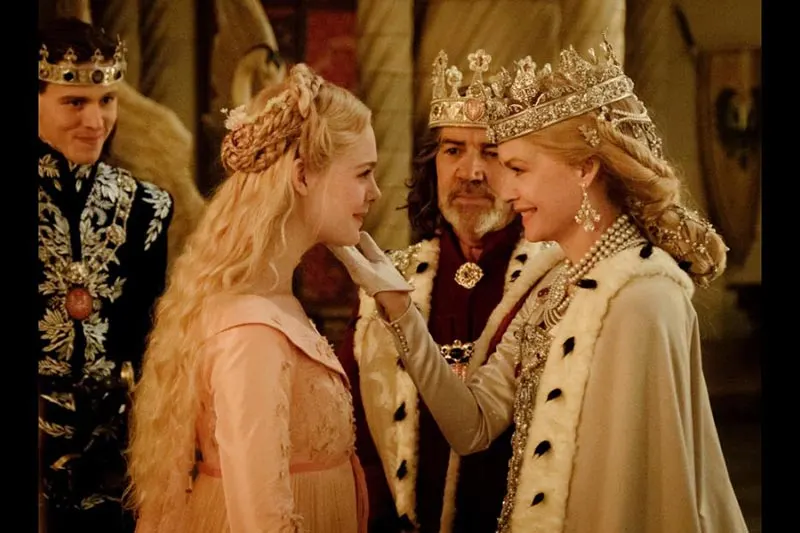 Movie still of Aurora with Prince Phillip and his parents