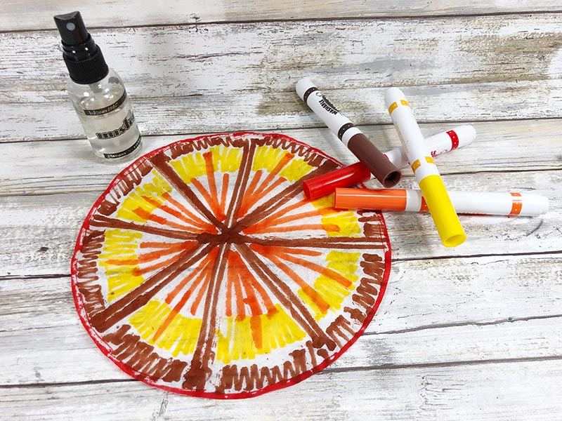 Coloring coffee filter with markers for thanksgiving turkey craft for kids