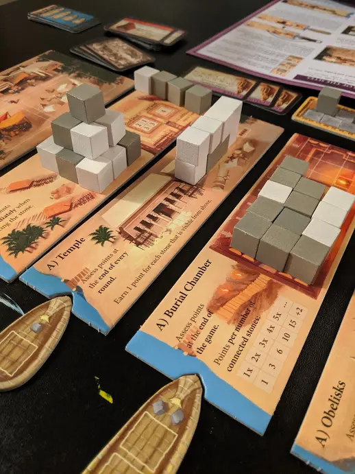 Playing Imhotep board game.