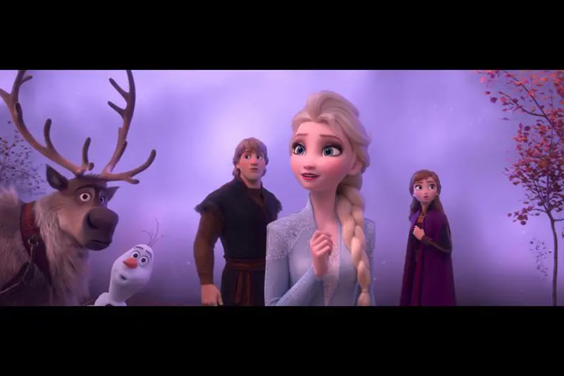 Frozen 2 movie still of Sven, Olaf, Kristoff, Anna, and Elsa with fog behind them.
