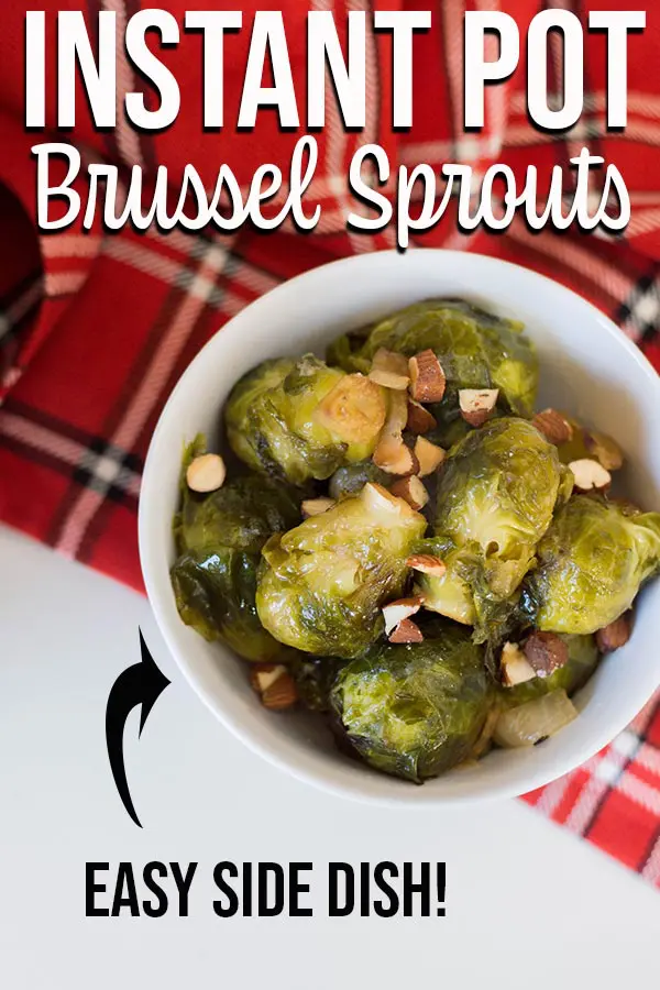 Overhead view of bowl of cooked Brussels sprouts on a red plaid kitchen cloth with text overlay.