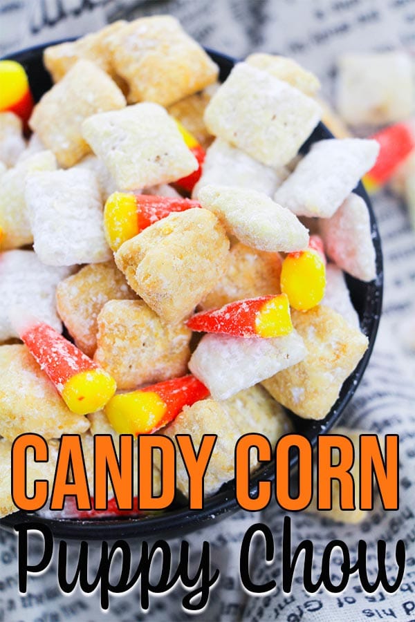 Close up of prepared candy corn puppy chow in black bowl
