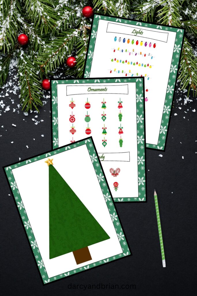 Mockup preview of printable decorate a Christmas tree game. Shows the tree game mat and decorations to cut out and place on the tree.