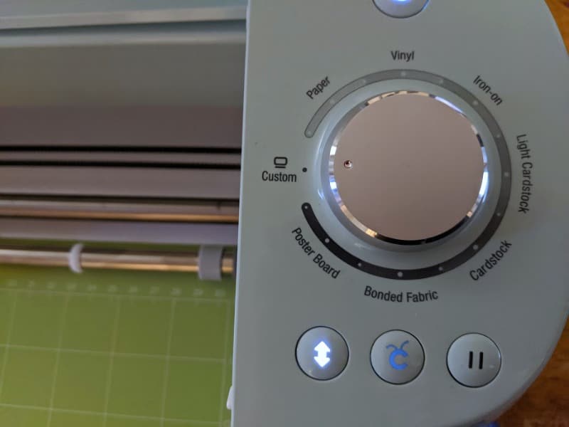 Close up view of dial settings and buttons on the Cricut Explore Air 2.