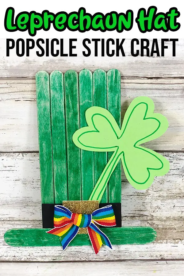 Completed leprechaun hat popsicle stick craft with text overlay.