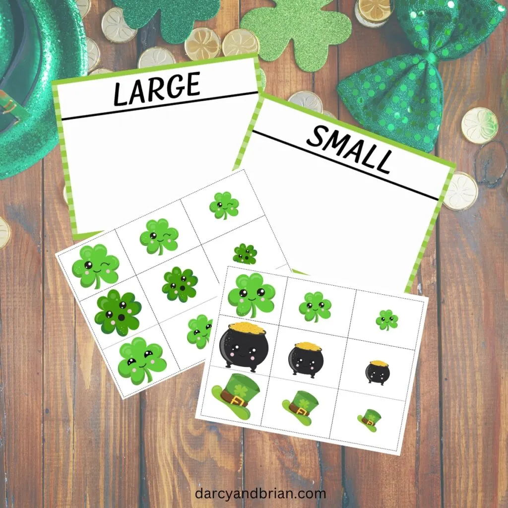 Four pages of saint patricks day size sorting activity on a background of a table covered with various holiday themed items.