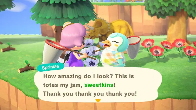 Player giving gift to Sprinkle, penguin villager in Animal Crossing New Horizons in game screenshot.