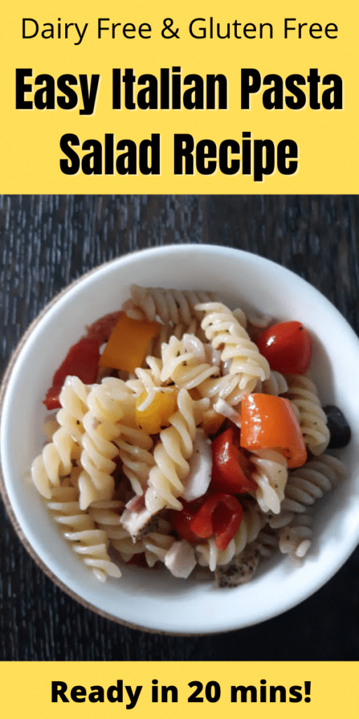 Yellow background with black text Dairy Free & Gluten Free Easy Italian Pasta Salad Recipe above picture of the pasta salad in a white bowl.