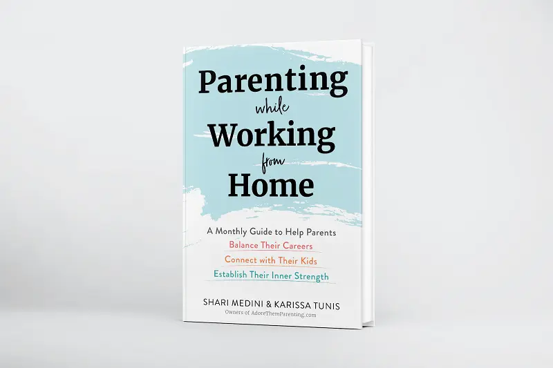 Parenting While Working From Home hardcover book standing up on white background.