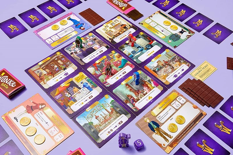 Golden Ticket board game set up on light purple background.
