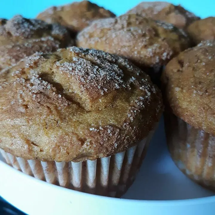 Side view of muffins on plate.