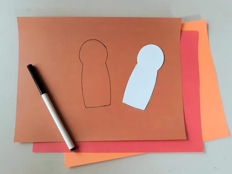 Used turkey body template to trace shape onto brown construction paper.