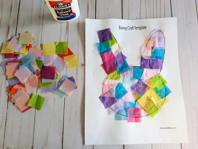 Tissue paper squares in popular spring colors glued to bunny template printout.