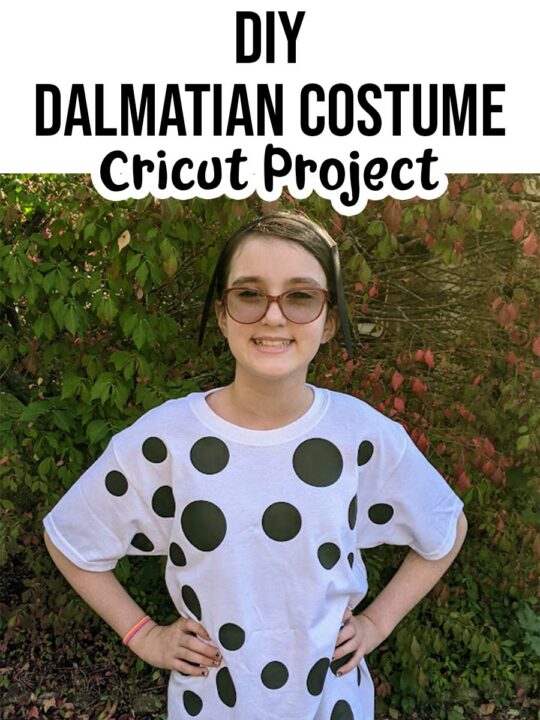 White tween girl wearing white tshirt with various black spots ironed on and black headband with black felt dog ears. Above picture is black text on white background that says DIY Dalmatian Costume Cricut Project.