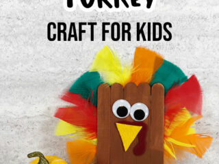 Black text at top says Popsicle Stick Turkey Craft for Kids above completed craft project of turkey made out of popsicle sticks, craft feathers and felt. Turkey sitting next to yellow gourd decoration.