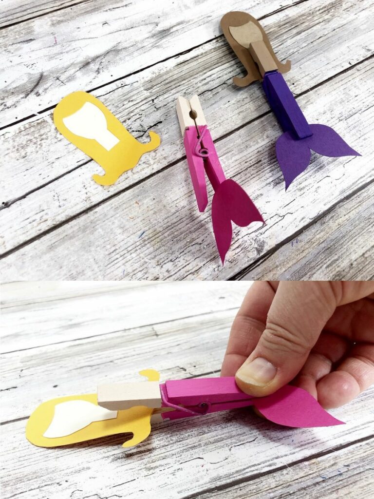 Two craft process photos stacked in vertical image. Top one shows a mermaid head with hair laying on table and pink painted clothespin turned on its side next to an assembled mermaid. Bottom image shows hand pinching bottom of clothespin to open it and slide paper head into it.
