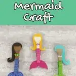 White text outlined with black on green background at top of image says Clothespin Mermaid Craft. Three completed mermaids arranged next to each other. One has dark skin tone, black hair, and dark blue tail. One has light skin, yellow hair, and pink tail. One has light brown skin tone, aqua hair and lime green tail.