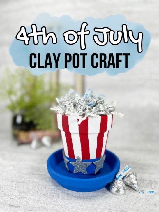 Top of image has black and white text over a blue watercolor splash that says 4th of July Clay Pot Craft. A small clay flower pot and saucer are painted red, white, and blue to look like Uncle Sam's hat. It is filled with white crinkle paper and Hershey's kisses.