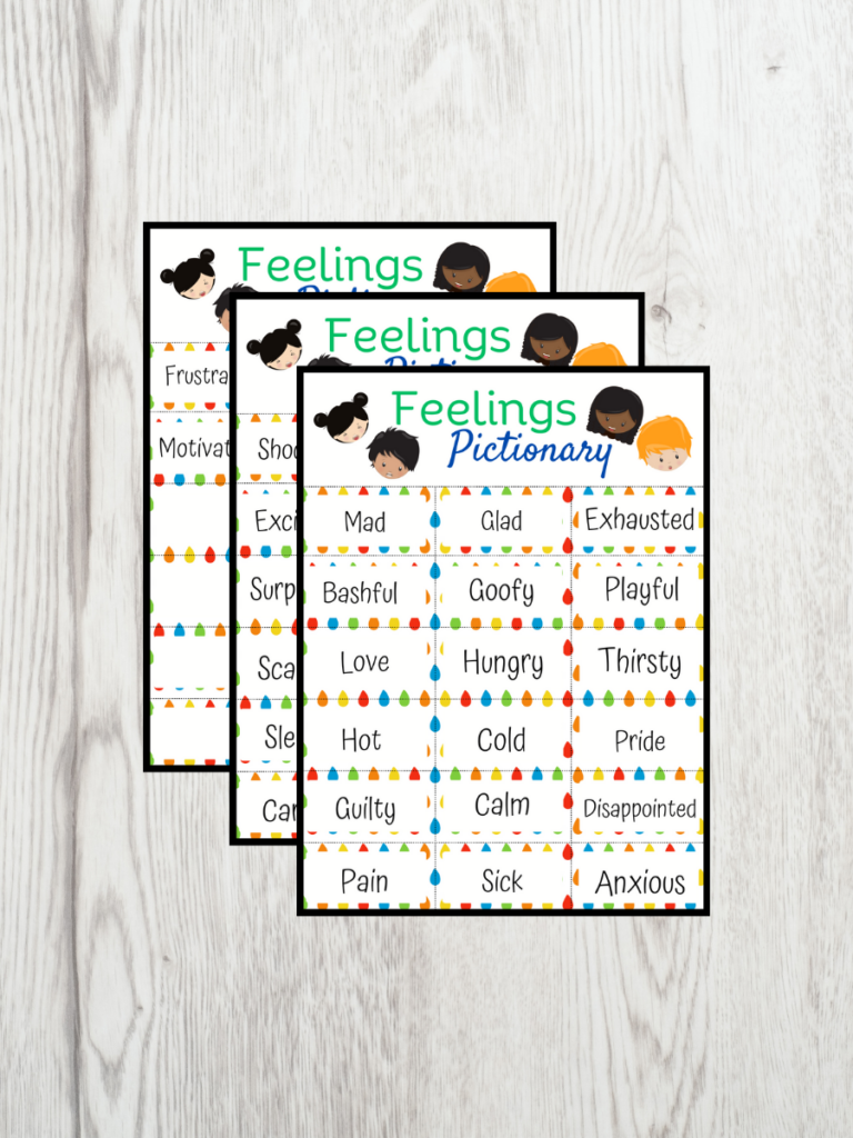 Feelings Pictionary printable pages mockup with all three pages overlapping each other on a white wood background.