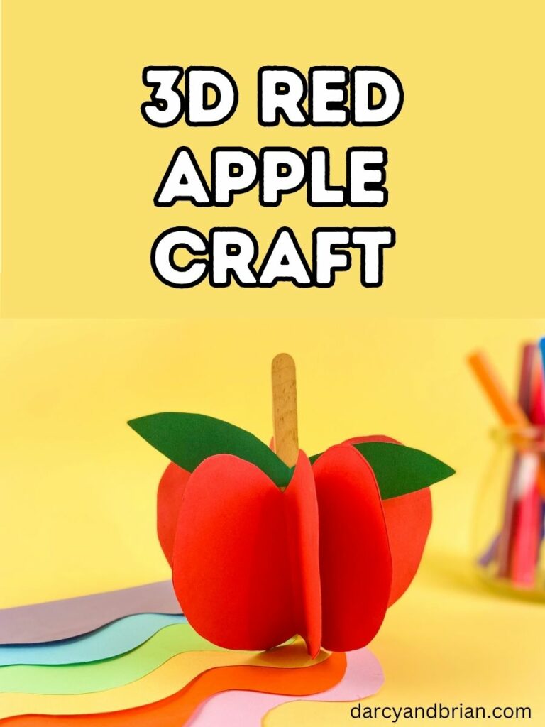 White text with black outline on yellow background says 3D Red Apple Craft. Below text is a picture of an apple craft made out of red paper standing upright with a popsicle stick stem and green leaf. Craft supplies are in the background.