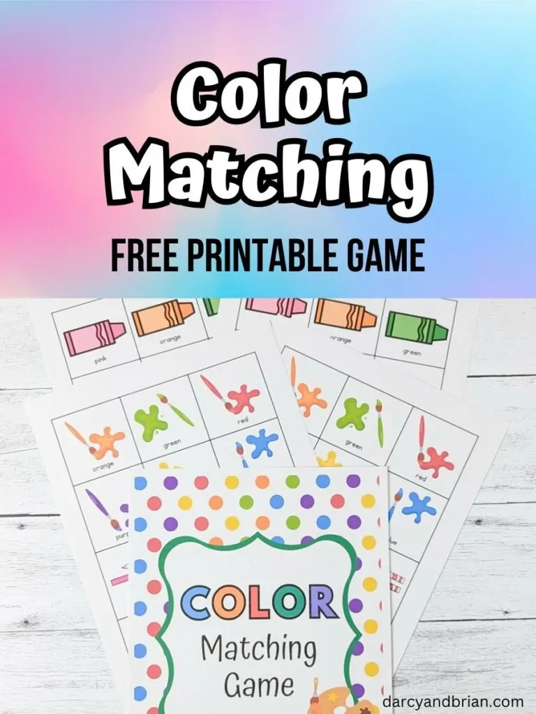 Top part of image has text over a multi-colored background that says Color Matching Free Printable Game. Below is a photo of the printable pages fanned out on a table.