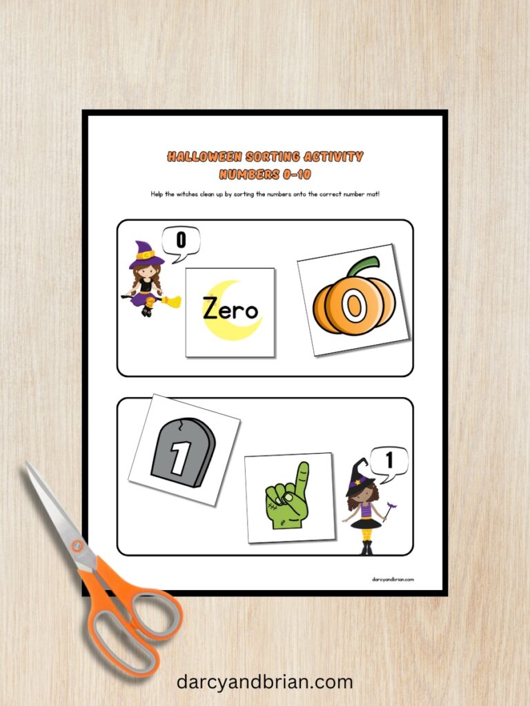 Preview of Halloween sorting mats 0 and 1 with several number cards placed with the corresponding number. A pair of scissors is in the lower left corner.