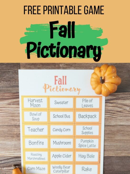 Top part of image has black text on orange and green background that says Free Printable Game Fall Pictionary. Below that is a photo of a sheet of prompt cards on a table. A decorative little pumpkin and gourd nearby.