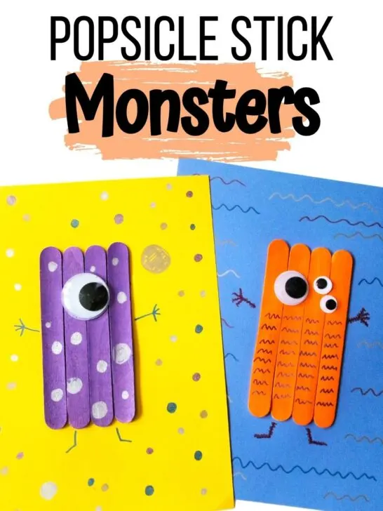 Black text at the top with a light orange brush stroke says Popsicle Stick Monsters. Two different monster crafts glued to card stock lay overlapping each other.
