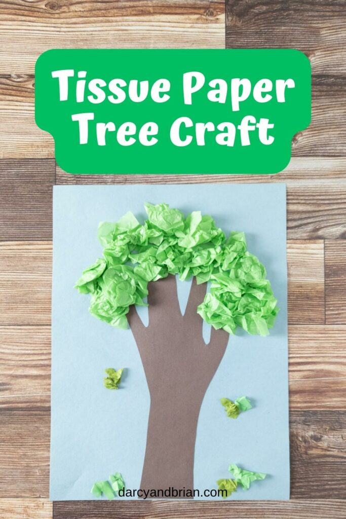 Tree made using a construction paper handprint and scrunched up tissue paper.