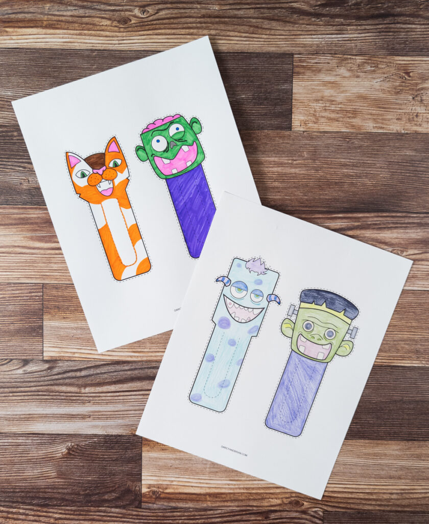 Two pages of colored in bookmarks. The cat and zombie were colored with markers. The Monster and Frankenstein were colored in with colored pencils.