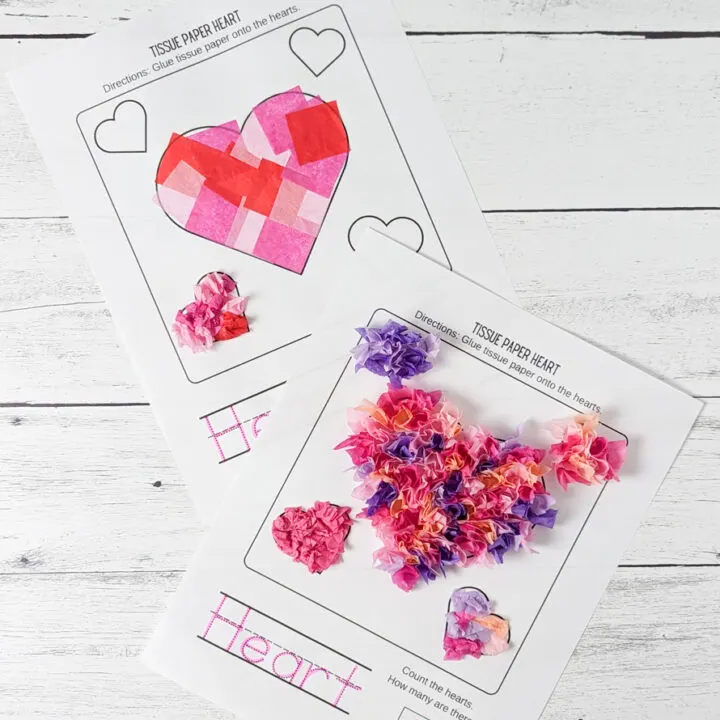 Two heart templates with a variety of pinks and purples glues to them. One has crumpled pieces and the other flat pieces giving them different texture looks.