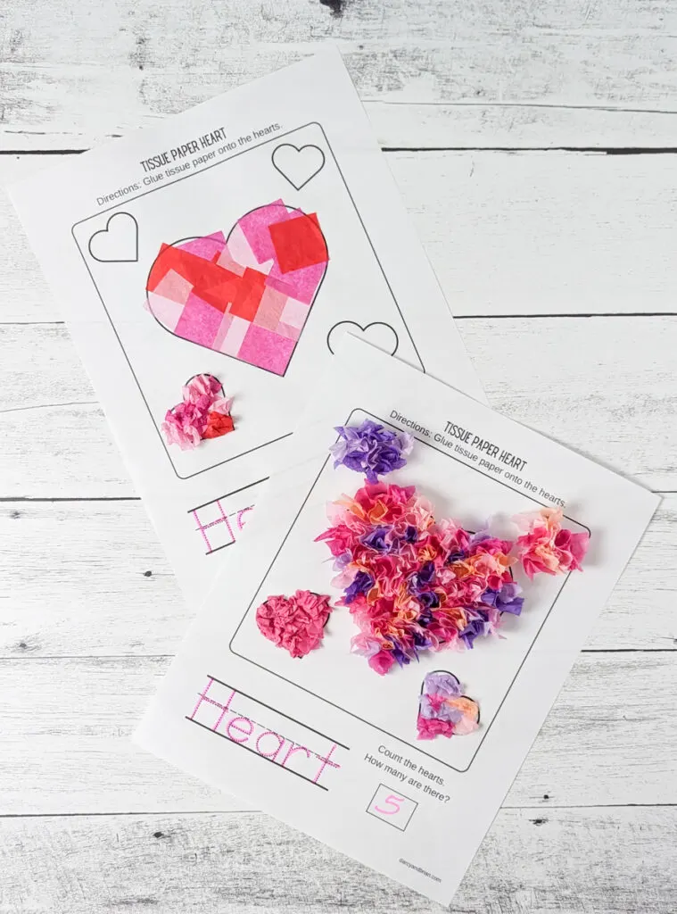 Two heart templates with a variety of pinks and purples glues to them. One has crumpled pieces and the other flat pieces giving them different texture looks.