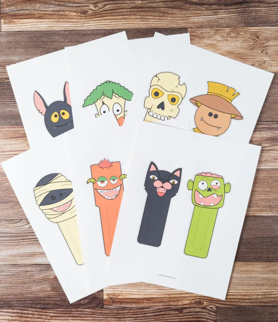 12 different Halloween themed bookmarks printed out in full color.