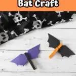 White text on light orange background at top says Clothespin Bat Craft. Two completed bats: one is black with purple wings and one is orange with black wings.