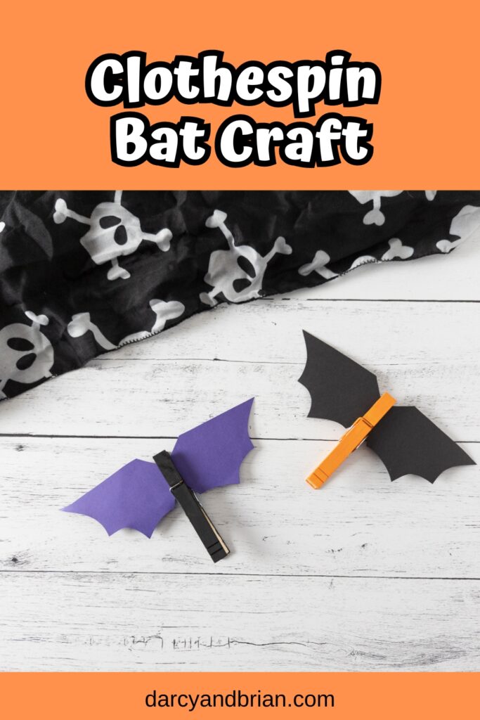 White text on light orange background at top says Clothespin Bat Craft. Two completed bats: one is black with purple wings and one is orange with black wings.