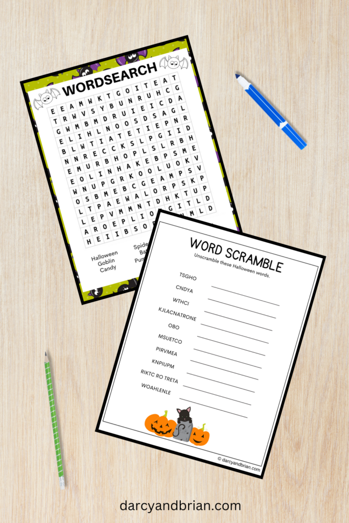 Mockup of Halloween word scramble and word search on desk with marker and pencil.