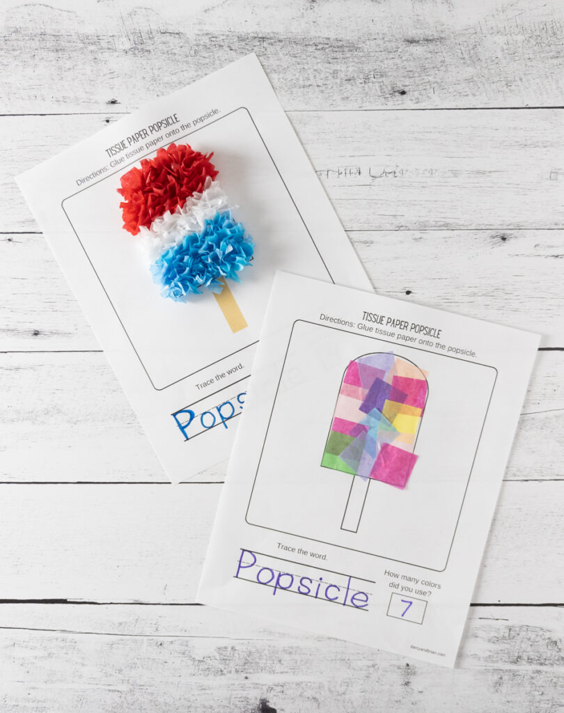 Two finished popsicles made out of tissue paper. One is multi-colored with tissue paper glued down flat. The other looks like an iconic popsicle type and is sticking out with a 3D effect.